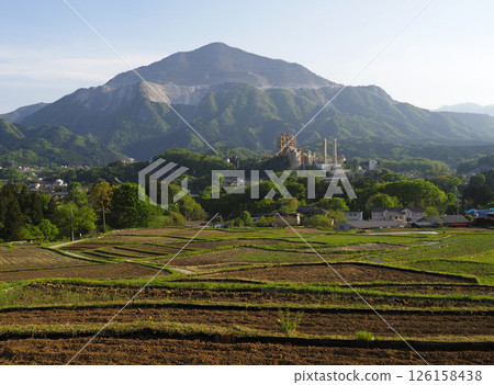 Terasaka rice terraces, before plowing, spring evening view 126158438
