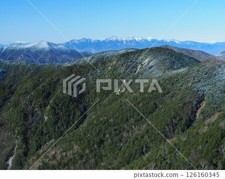 Yatsugatake in early winter as seen from Mount Kobushi in Okuchichibu 126160345