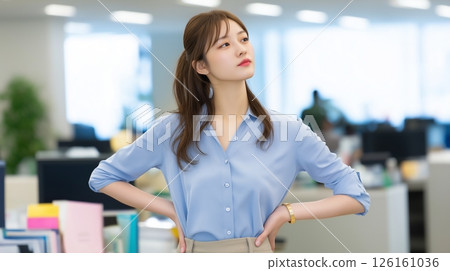 Businesswoman posing confidently in the office 126161036