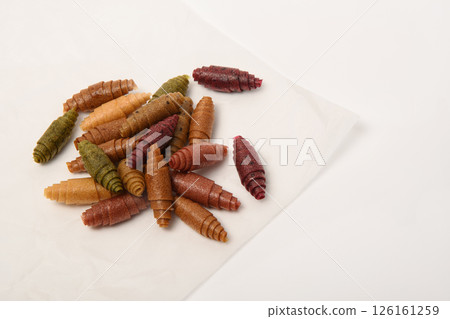 Pattern pastila fruit leather rolls up with fruits on white background.Horizontally. 126161259