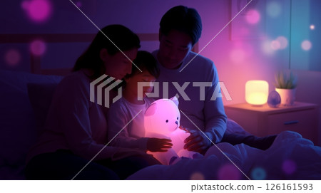 Family enjoys bedtime with a glowing teddy bear while sharing a warm moment in a cozy room at night Family enjoys bedtime with a glowing teddy bear while sharing a warm moment in a cozy room at night 126161593