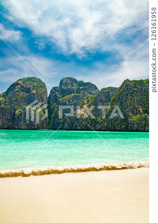 sea surf on Maya Bay beach on Ko Phi Phi Lee Thailand, vertical frame sea surf on Maya Bay beach on Ko Phi Phi Lee Thailand, vertical frame 126161958