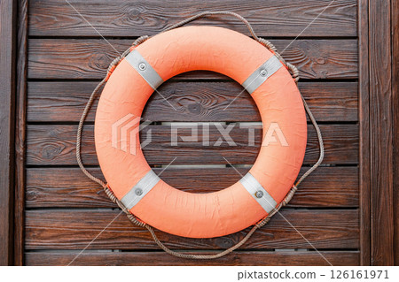 old marine lifebuoy on wooden wall old marine lifebuoy on wooden wall 126161971