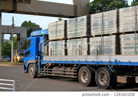 Image of a truck transporting temporary materials 126162208