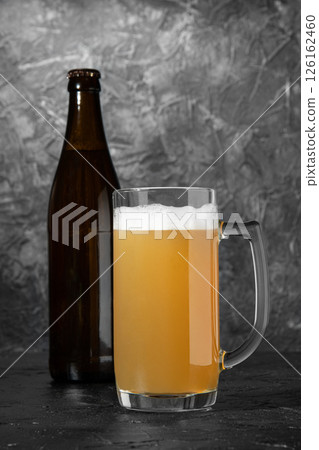 Light beer at Oktoberfest. Glass of beer. 126162460