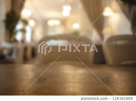 Blurred interior view of cozy restaurant with wooden table and soft lighting ambiance Copy space Blurred interior view of cozy restaurant with wooden table and soft lighting ambiance Copy space 126162809
