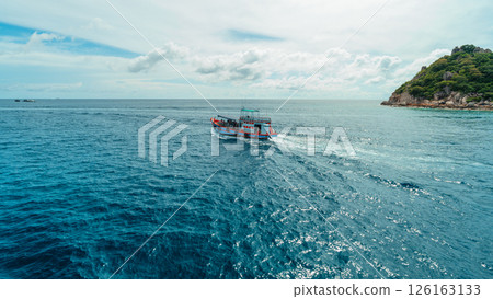 Boat for snorkeling tours near the island Boat for snorkeling tours near the island 126163133
