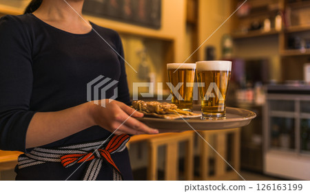 Working at a bar Working at a bar 126163199