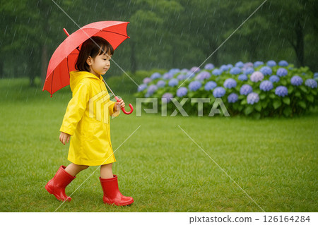A little girl in a raincoat walking through a park in the rainy season | A seasonal photo-style illustration of hydrangeas and light rain 126164284