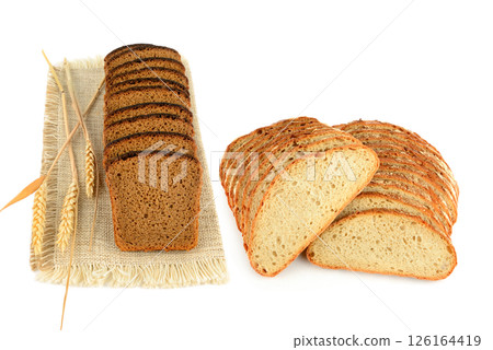 Sliced Freshly baked Bread isolated on white background. Bakery, rustic traditional food concept. Sliced Freshly baked Bread isolated on white background. Bakery, rustic traditional food concept. 126164419