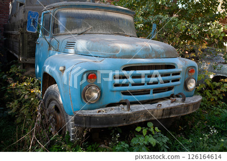 Broken abandoned rusty old vehicle. Retro damaged transportation. 126164614