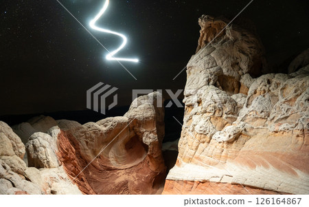 Drone used for light painting in White Pocket National Monument.  Located in Northern Arizona.  An aerial and abstract light painting. 126164867