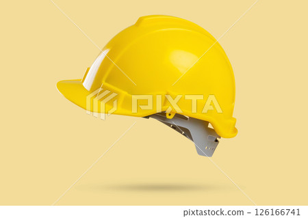 Safety construction helmet on yellow background 126166741