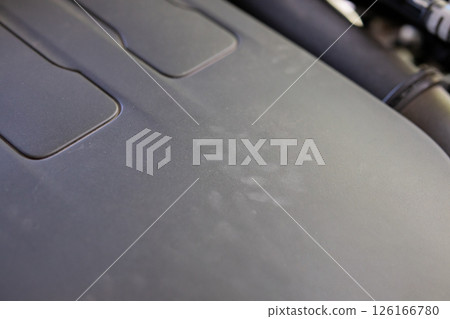 Rat footprint in the car engine 126166780