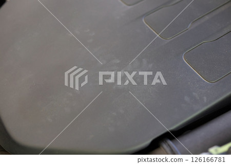 Rat footprint in the car engine 126166781