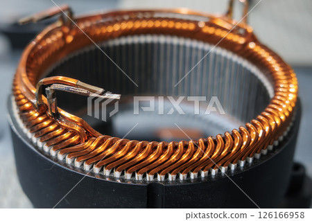 Close up scene the electric motor parts manufacturing process. 126166958