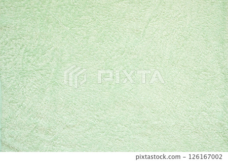 Green fluffy towel fabric soft texture background Green fluffy towel fabric soft texture background 126167002