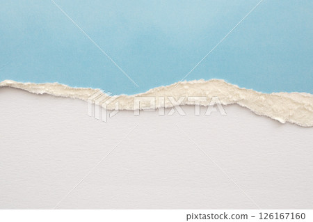 Blue ripped paper torn edges strips on white paper background 126167160