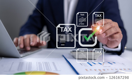 Tax documents and savings, Corporate and individual tax payment concept, Businessman using computer filling out corporate and personal income tax return, VAT of business, Submit request refund tax. 126167298