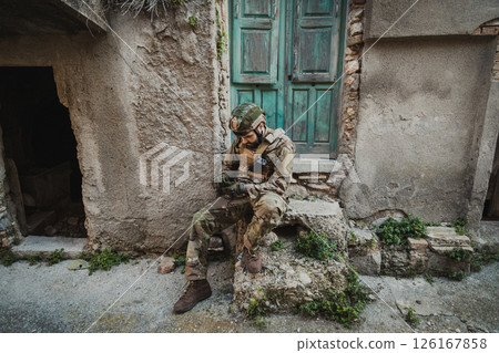 Soldier In War Opens The Compass To Understand Where He Is 126167858