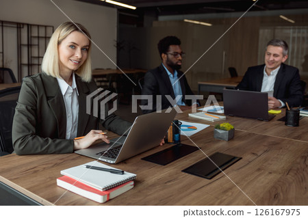 Group of business consultants working together in the office Group of business consultants working together in the office 126167975