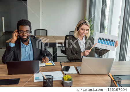 Business consultants having online call with the client and looking busy 126167994