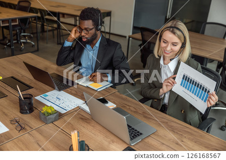 Business consultants having online call with the client and looking busy 126168567