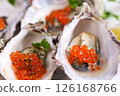 Raw oyster on white background 126168766