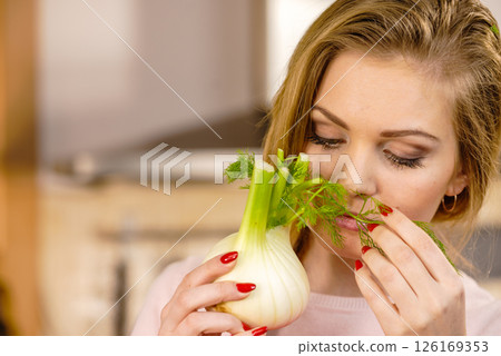 Woman holding fennel bulb 126169353