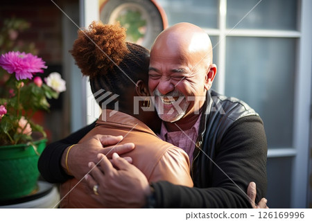 Cultural Harmony Diverse Pair's Genuine Embrace at Front Door, Evident Joy and Connection Illuminate Treasured Moments in Multicultural Relationships. created with Generative AI Cultural Harmony Diverse Pair's Genuine Embrace at Front Door, Evident Joy and Connection Illuminate Treasured Moments in Multicultural Relationships. created with Generative AI 126169996