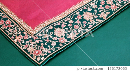 Exquisite Pink and Teal Embroidered Saree Border Detail Indian Textile Close up 126172063