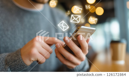 Engaging with digital communication at a cozy cafe during the afternoon Engaging with digital communication at a cozy cafe during the afternoon 126172864