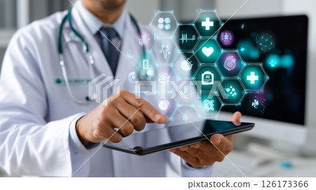 Healthcare professional interacts with digital health technology while working in a modern clinic during daytime hours 126173366
