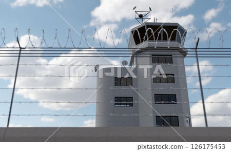 Air Traffic Control Tower Behind Barbed Wire Fence. 126175453