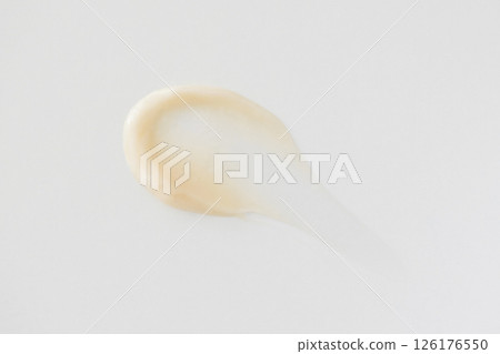 Minimalist beige smear cream on white background Minimalist beige smear cream on white background 126176550