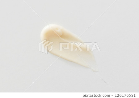 Beige cream smear on white background, shampoo, hair conditioner, shower gel or soap skincare Beige cream smear on white background, shampoo, hair conditioner, shower gel or soap skincare 126176551