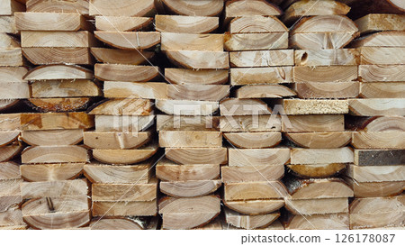 Stacked Wooden Logs Arranged in Neat Horizontal Alignment Close-Up Stacked Wooden Logs Arranged in Neat Horizontal Alignment Close-Up 126178087