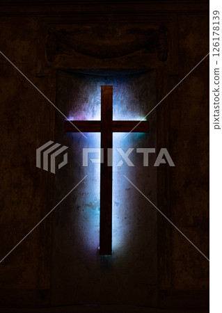 Abstract cross in church on black cement background 126178139