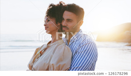 Hug, love and couple on beach for travel, romance and support on vacation for summer with sunset. Ocean, people and adventure with connection for commitment, care and holiday together on island 126178296