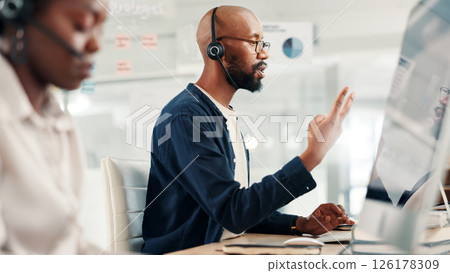 Man, agent or discussion with headset at call center for customer service or online advice. Male person, consultant or employee talking with mic on technology for virtual assistance or help at office 126178309