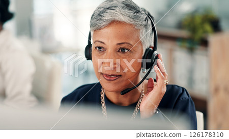 Mature woman, consultant and listening with headset on computer for online advice or customer service. Female person, agent or employee with mic or technology for virtual assistance at call center Mature woman, consultant and listening with headset on computer for online advice or customer service. Female person, agent or employee with mic or technology for virtual assistance at call center 126178310