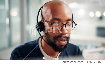 Talking, call center and business man in office for contact us, crm service and customer support. Glasses, professional consultant and person with headset for communication, advice and feedback Talking, call center and business man in office for contact us, crm service and customer support. Glasses, professional consultant and person with headset for communication, advice and feedback 126178369