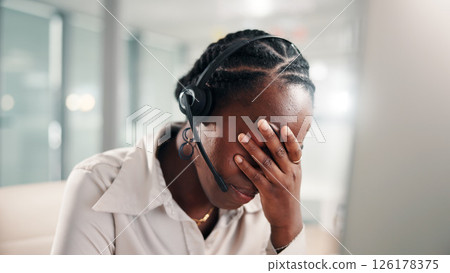 Frustrated, black woman and consultant with headset or stress for mistake, error or compliance issue. Female person, agent or anxiety with fail for difficult customer or pressure at call center 126178375