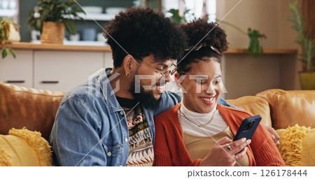 Phone, happy couple and relax in home on internet for social media post, video and financial news. Mobile, man and woman in living room with app for online banking, check account and credit score Phone, happy couple and relax in home on internet for social media post, video and financial news. Mobile, man and woman in living room with app for online banking, check account and credit score 126178444