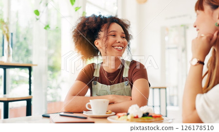 Girl, friends and happy with breakfast at restaurant for waffles date, fun conversation and bonding. Relax, people and talking at cafe for coffee break, gossip chat and hangout together with support 126178510