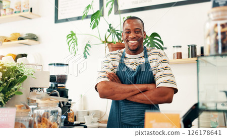 Portrait, welcome and black man in restaurant, arms crossed and hospitality industry with friendly service. African person, business owner or entrepreneur with pride, coffee shop and professional 126178641