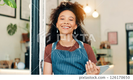 Barista, woman or tablet in door of cafe for customer welcome, seating plan or hospitality. Server, portrait or happy with digital app in restaurant doorway for online management or ready for service 126178650