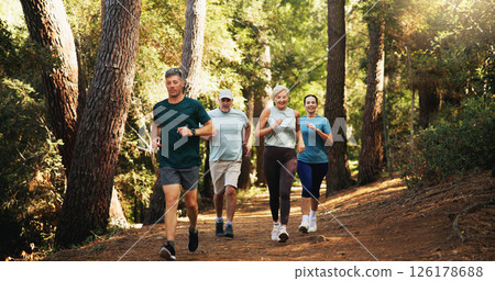 Running, group and people in woods, fitness and cardio with nature, workout and exercise. Health, athletes and runners in forest, wellness and energy with sprint, training or challenge with endurance 126178688