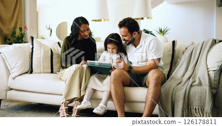 Home, parents and girl with tablet, smile and bonding together with happiness, internet and app for game. Father, mother and daughter in lounge, tech and online safety with entertainment and ebook 126178811