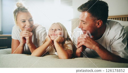 Happy, parents and relax with child in bedroom for love, security and bonding together on bed. Smile, people and resting with girl for support, care and family relationship for weekend break at house 126178852